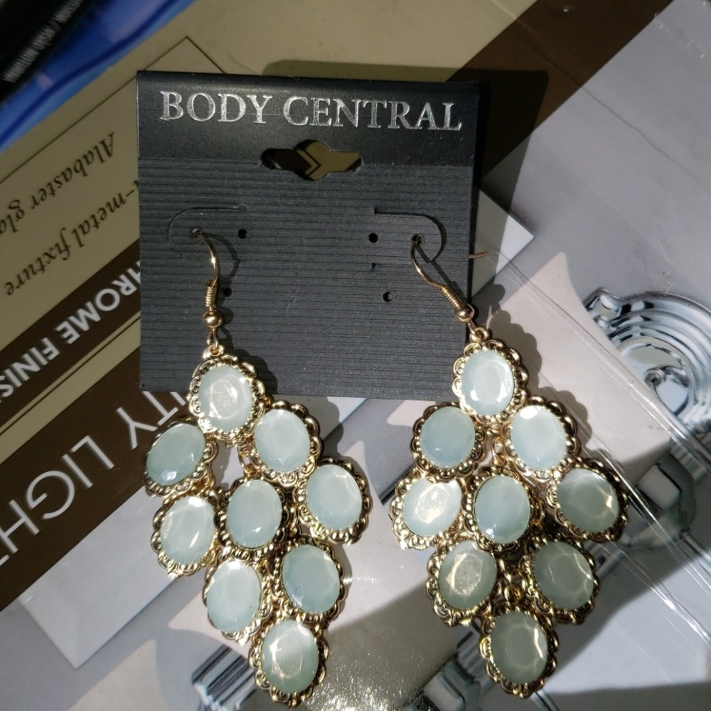 Body central earrings